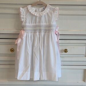 Classic White Smocked Girls' Formal Dress with Pink Ribbon
